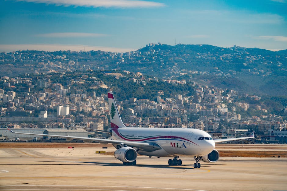 An airplane at Beirut Airport with the vibrant cityscape of Beirut in the background, showcasing urban life and travel.