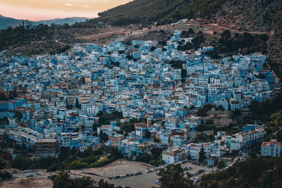 Discover the stunning aerial view of Chefchaouen, Morocco's iconic blue city nestled in the Rif Mountains.