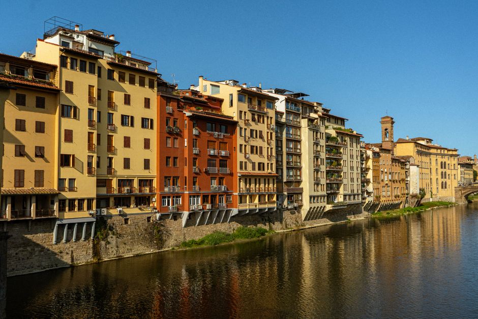 Charming view of riverside buildings in Florence, Italy, captivating architecture along the Arno River.