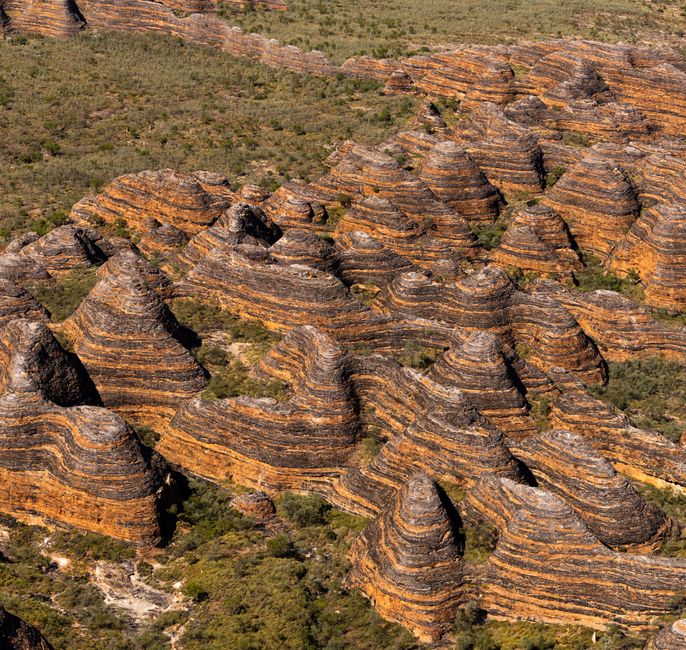 Stunning aerial view of the Bungle Bungle Range's striped domes in Purnululu, Australia.